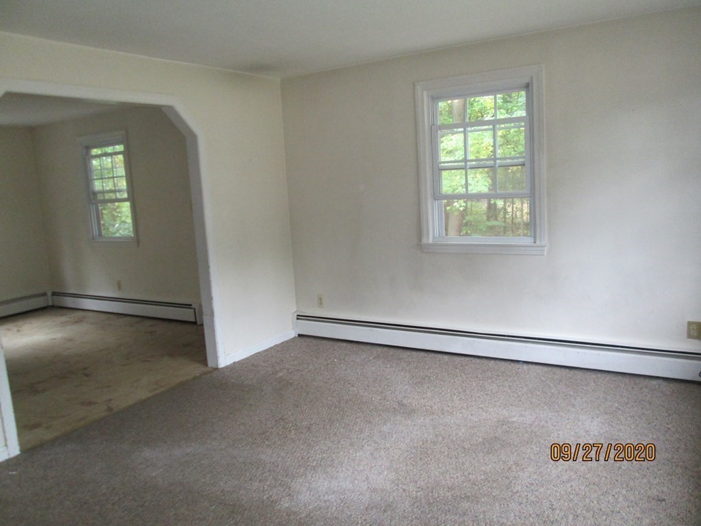 66 South Road Londonderry, NH 03053 - Photo 16 of 21 an empty room with windows