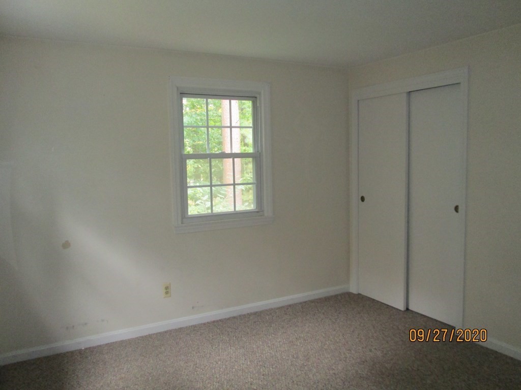 66 South Road Londonderry, NH 03053 - Photo 18 of 21 an empty room with a window
