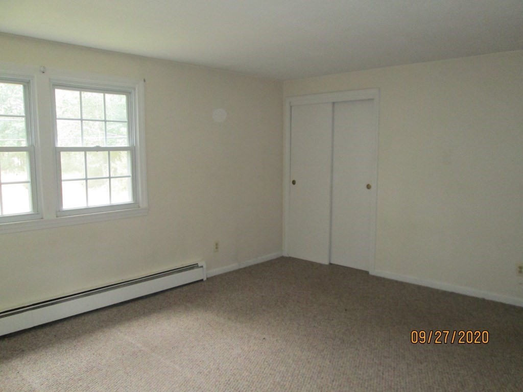 66 South Road Londonderry, NH 03053 - Photo 20 of 21 an empty room with a window