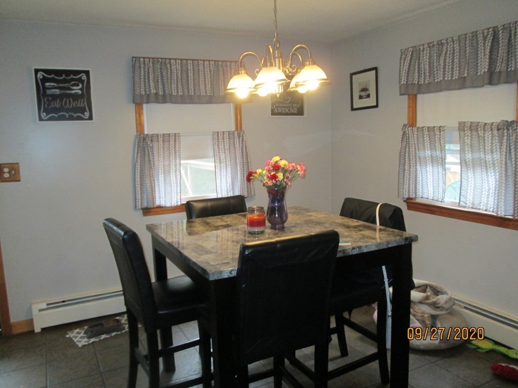 66 South Road Londonderry, NH 03053 - Photo 5 of 21 a dining room with furniture and window