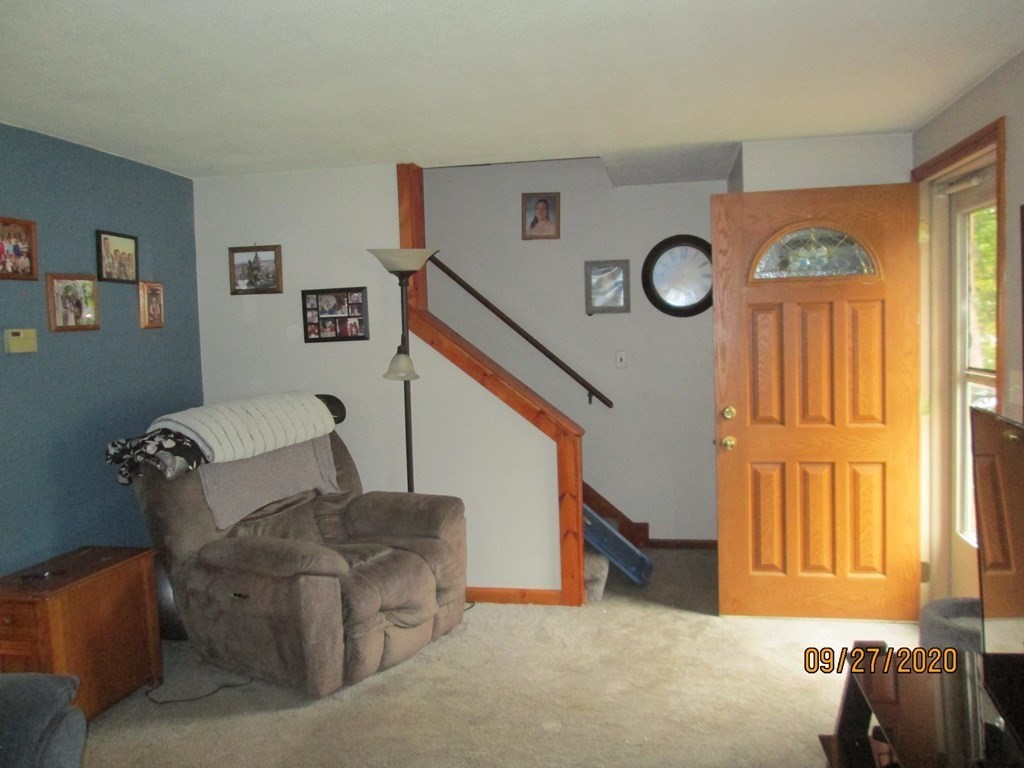 66 South Road Londonderry, NH 03053 - Photo 7 of 21 a living room with furniture and a window