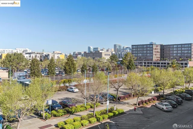 a view of a lake with tall buildings