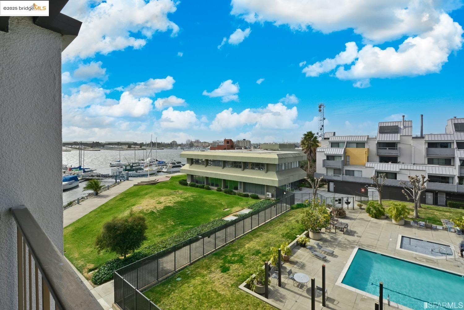 1 Embarcadero, Unit 161 Oakland, CA 94607 - Photo 18 of 31 Community pool featuring a water view and view of marina
