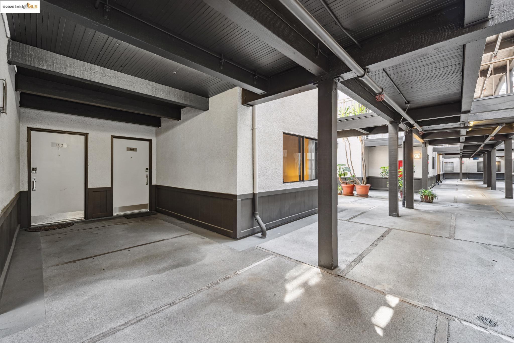 1 Embarcadero, Unit 161 Oakland, CA 94607 - Photo 21 of 31 Garage with wainscoting