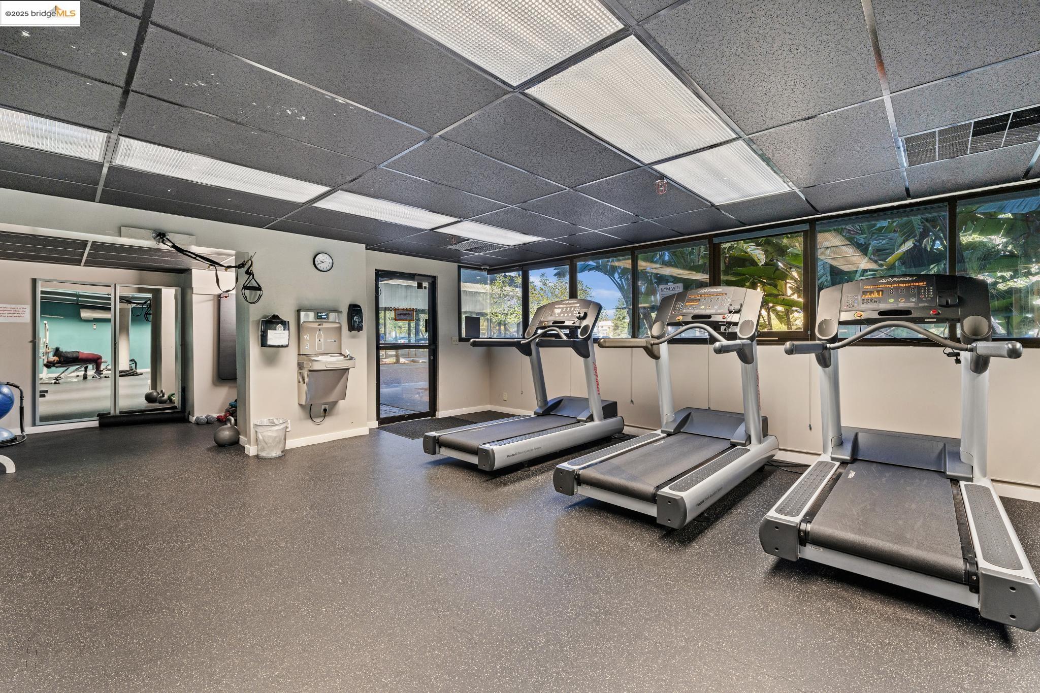 1 Embarcadero, Unit 161 Oakland, CA 94607 - Photo 9 of 31 Exercise room featuring a paneled ceiling