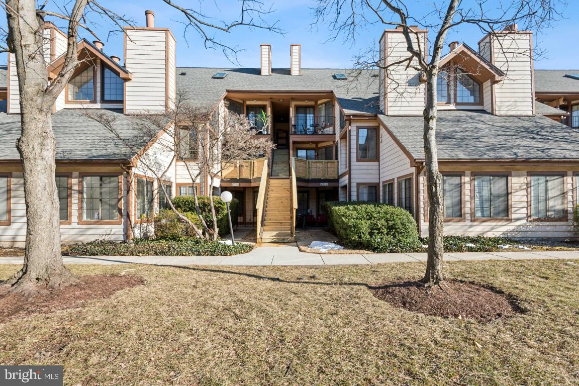 14109 William Street Laurel, MD 20707 - Photo 1 of 12 a view of a house with a iron gate
