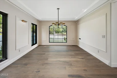 a view of staircase with wooden floor