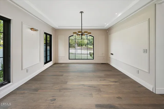 a view of staircase with wooden floor