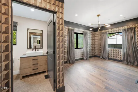 a bath tub sitting next to a window