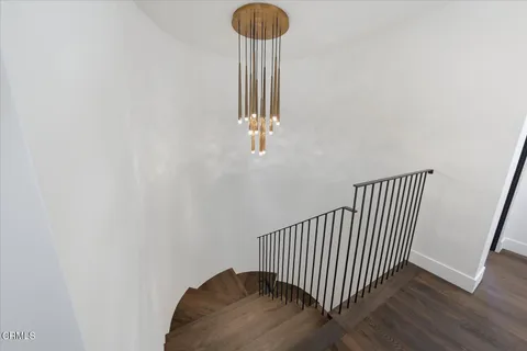 a bathroom with a sink a shower and a mirror