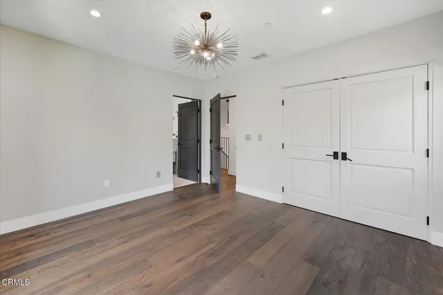 a view of a house with swimming pool and yard