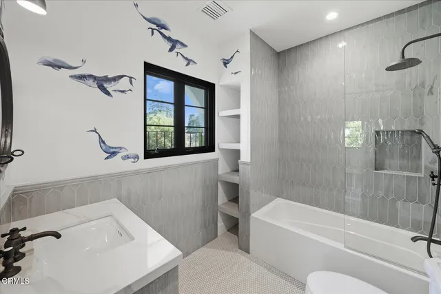 a view of a white house with a yard