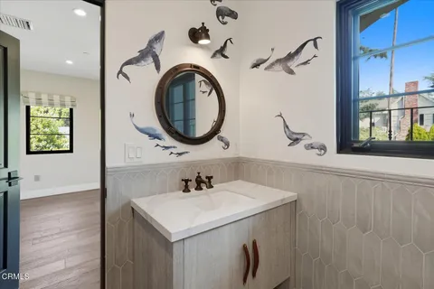 a view of a pathway with a garden