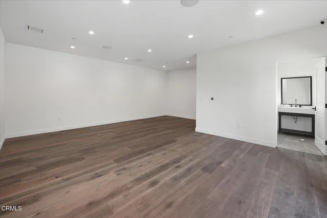 a view of workspace with furniture and window