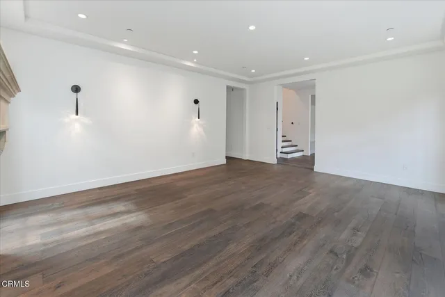 a view of kitchen with furniture and wooden floor