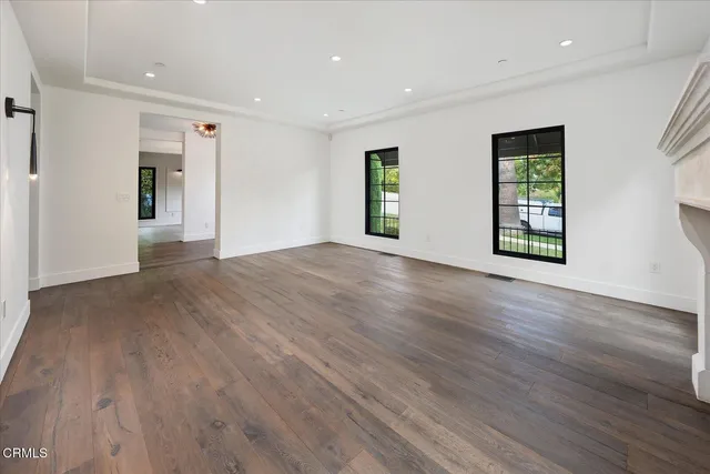 a view of kitchen with furniture and wooden floor
