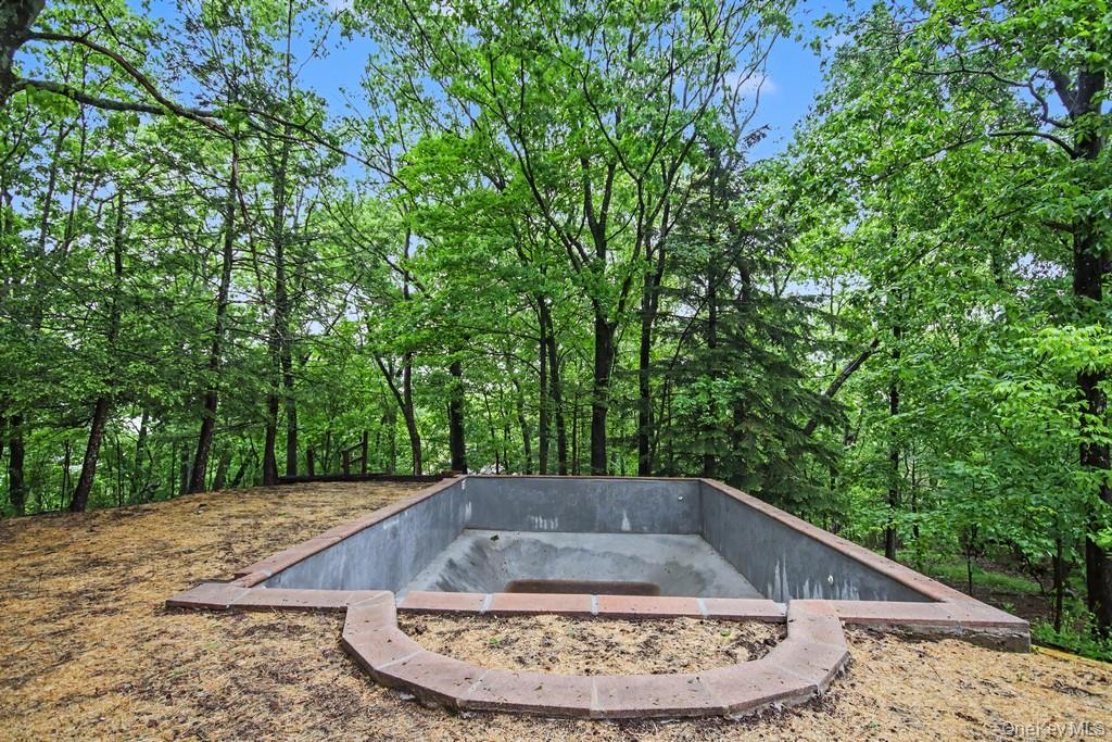 18 Hillside View Road Mahopac, NY 10541 - Photo 4 of 42 a view of a backyard of a house