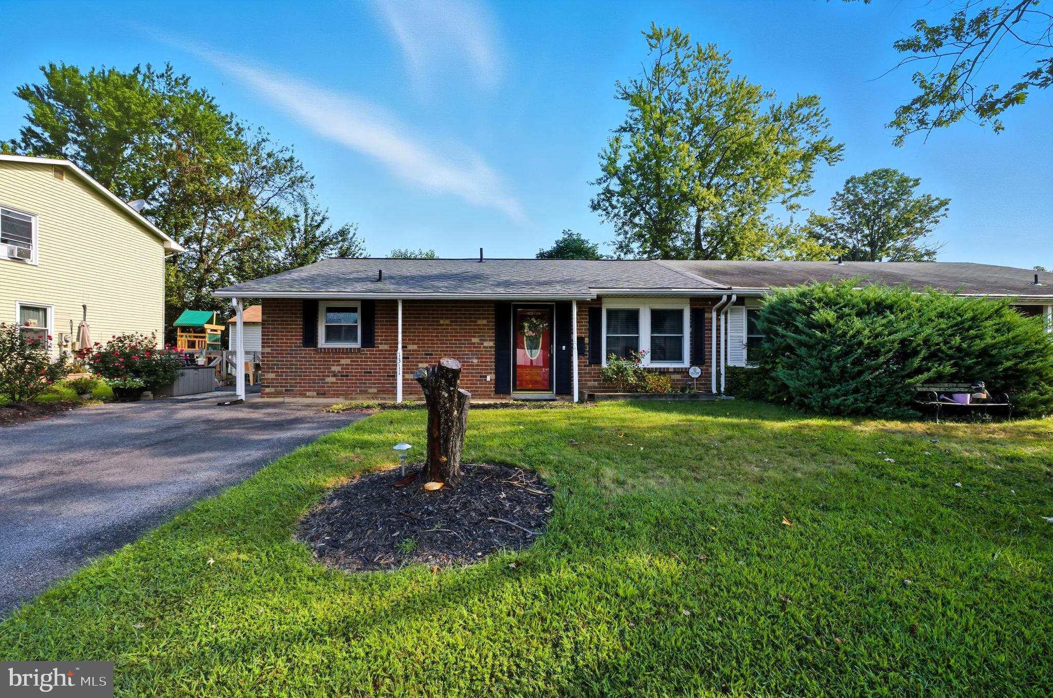 1311 Tenbrook Road Odenton, MD 21113 - Photo 2 of 37 a view of a house with a yard and potted plants