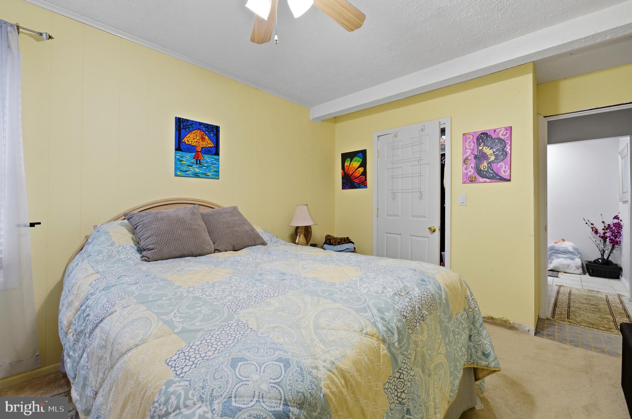 1311 Tenbrook Road Odenton, MD 21113 - Photo 21 of 37 a bedroom with a bed and a dresser