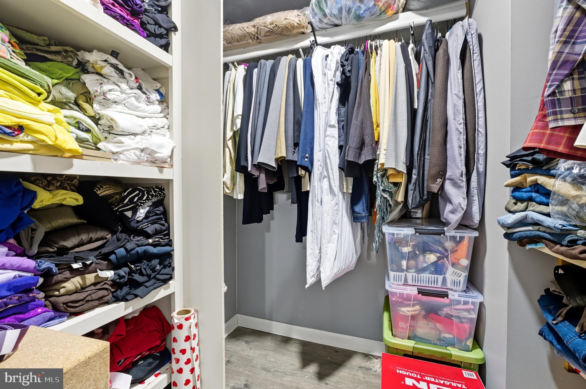 1311 Tenbrook Road Odenton, MD 21113 - Photo 23 of 37 a view of walk in closet with clothes and shoes