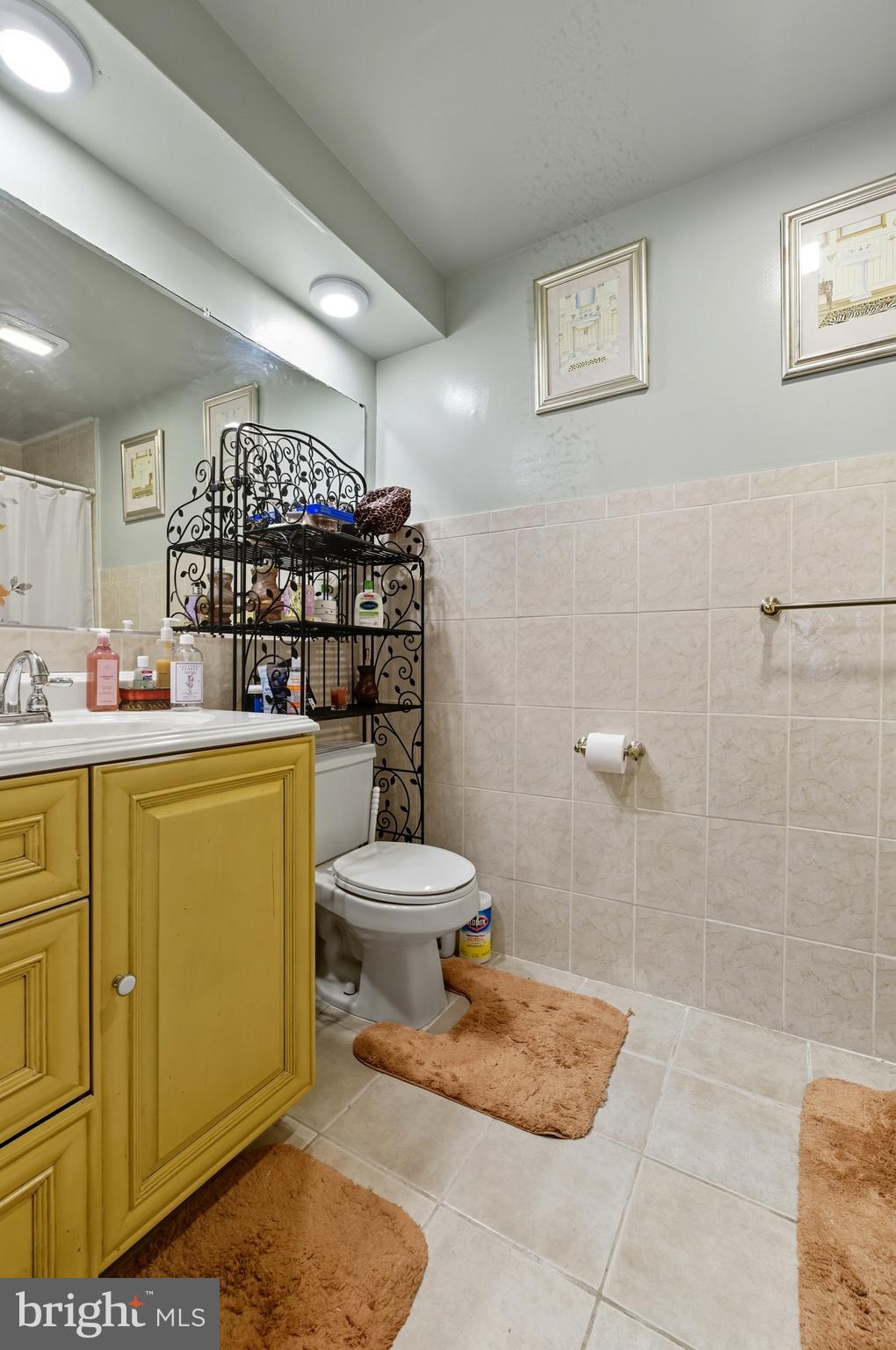 1311 Tenbrook Road Odenton, MD 21113 - Photo 25 of 37 a bathroom with a toilet a sink and shower