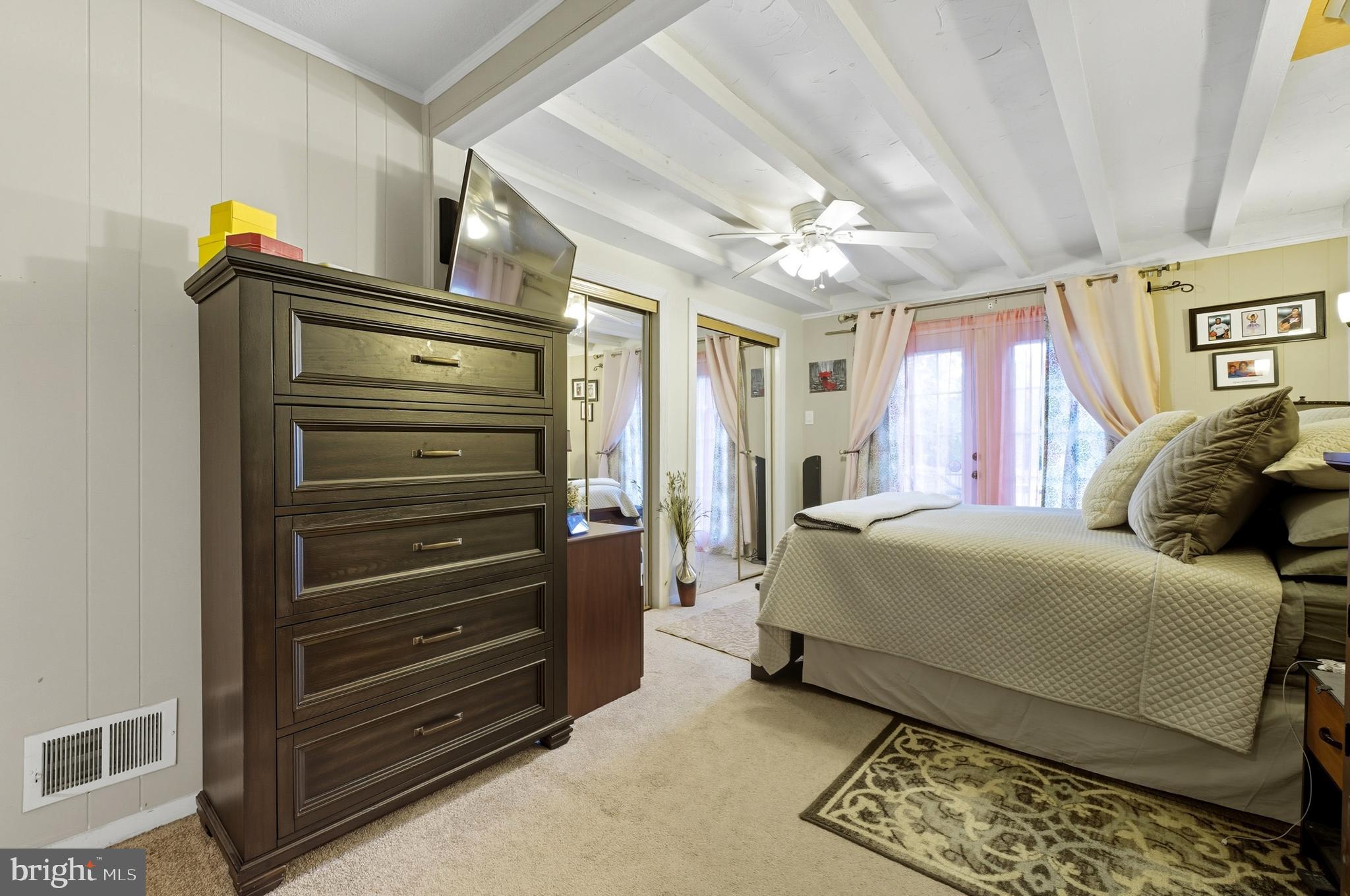 1311 Tenbrook Road Odenton, MD 21113 - Photo 29 of 37 a bedroom with a bed and a dresser