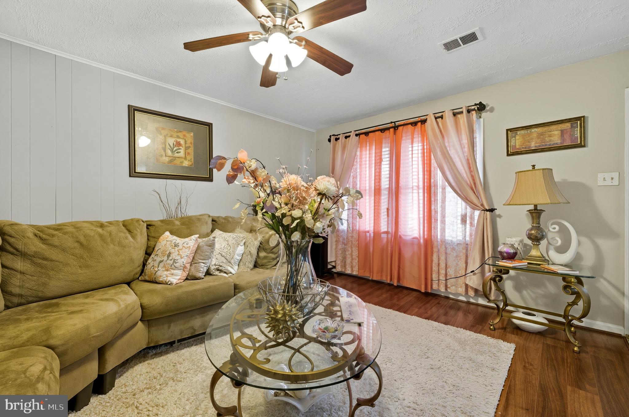 1311 Tenbrook Road Odenton, MD 21113 - Photo 10 of 37 a living room with furniture and a large window