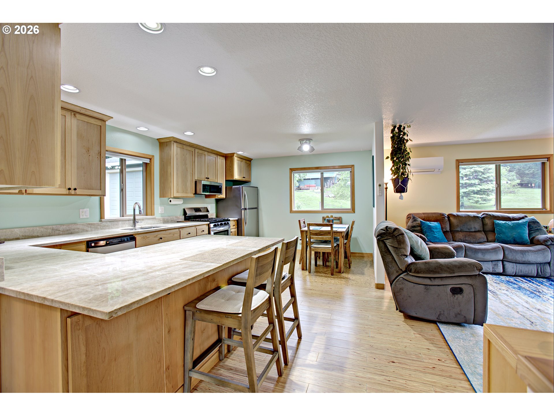 60300 Rays Way St. Helens, OR 97051 - Photo 8 of 41 a living room with furniture a dining table and kitchen view