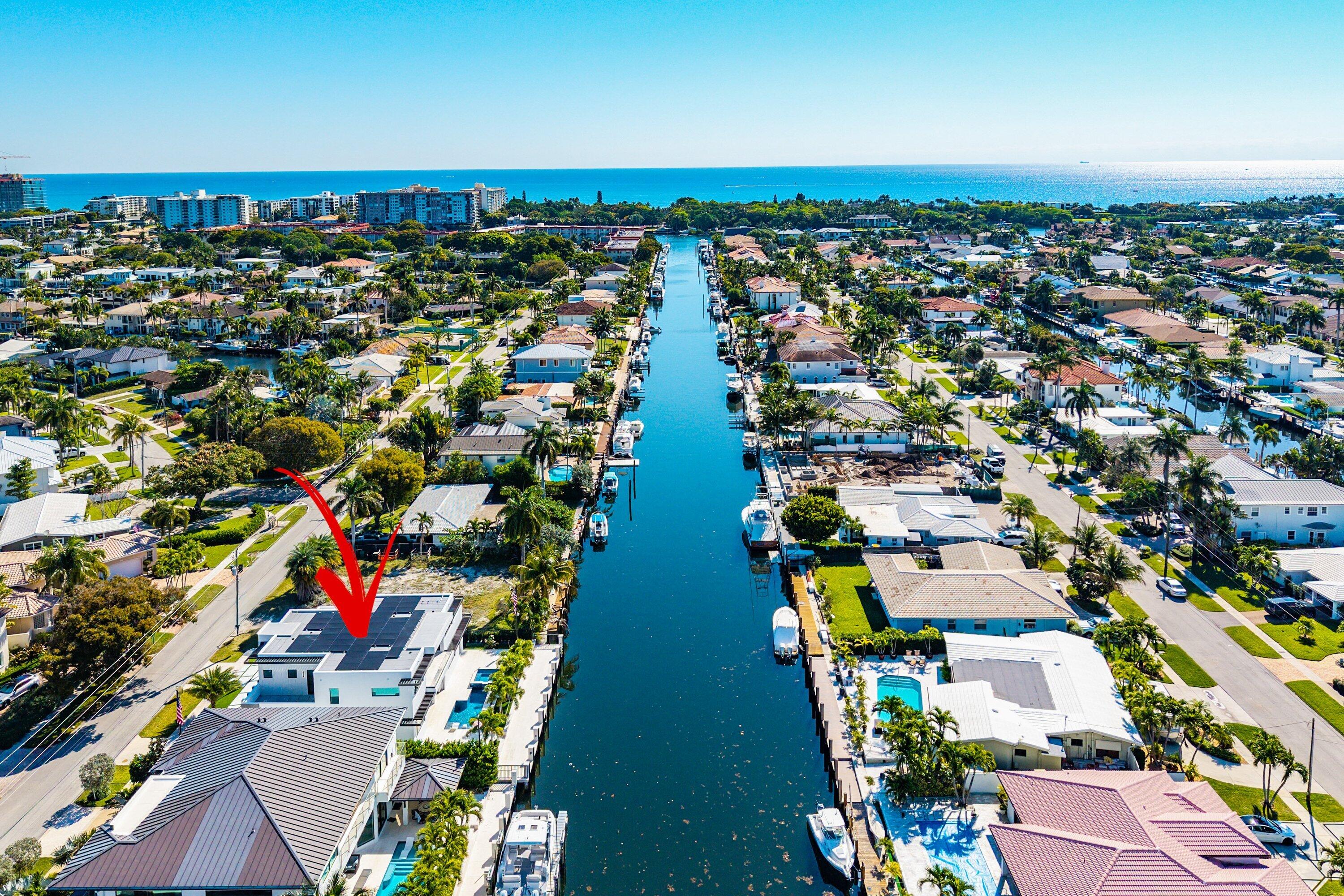 2650 Northeast 48th Court Lighthouse Point, FL 33064 - Photo 11 of 86 an aerial view of residential houses with outdoor space and seating