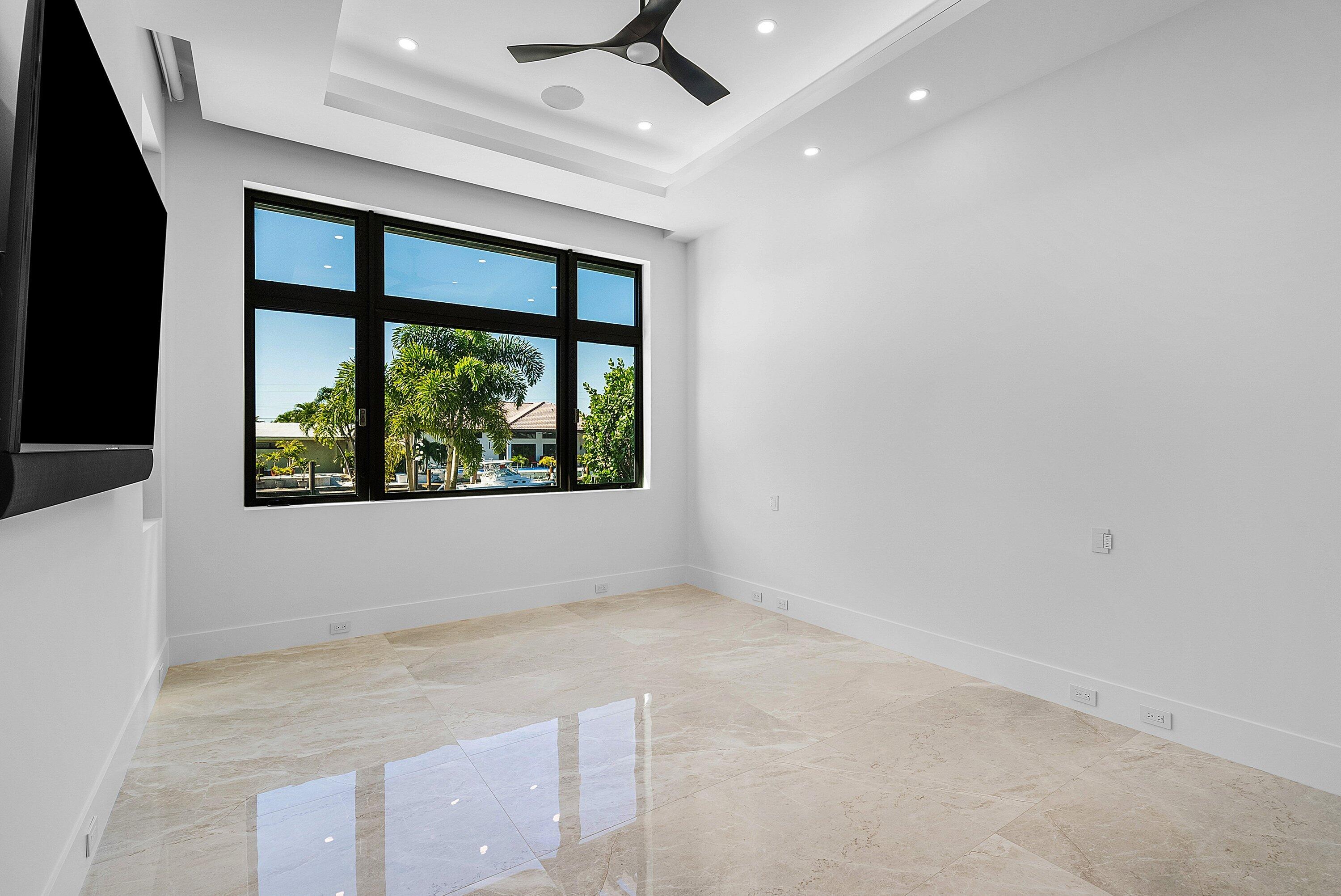 2650 Northeast 48th Court Lighthouse Point, FL 33064 - Photo 29 of 86 an empty room with windows