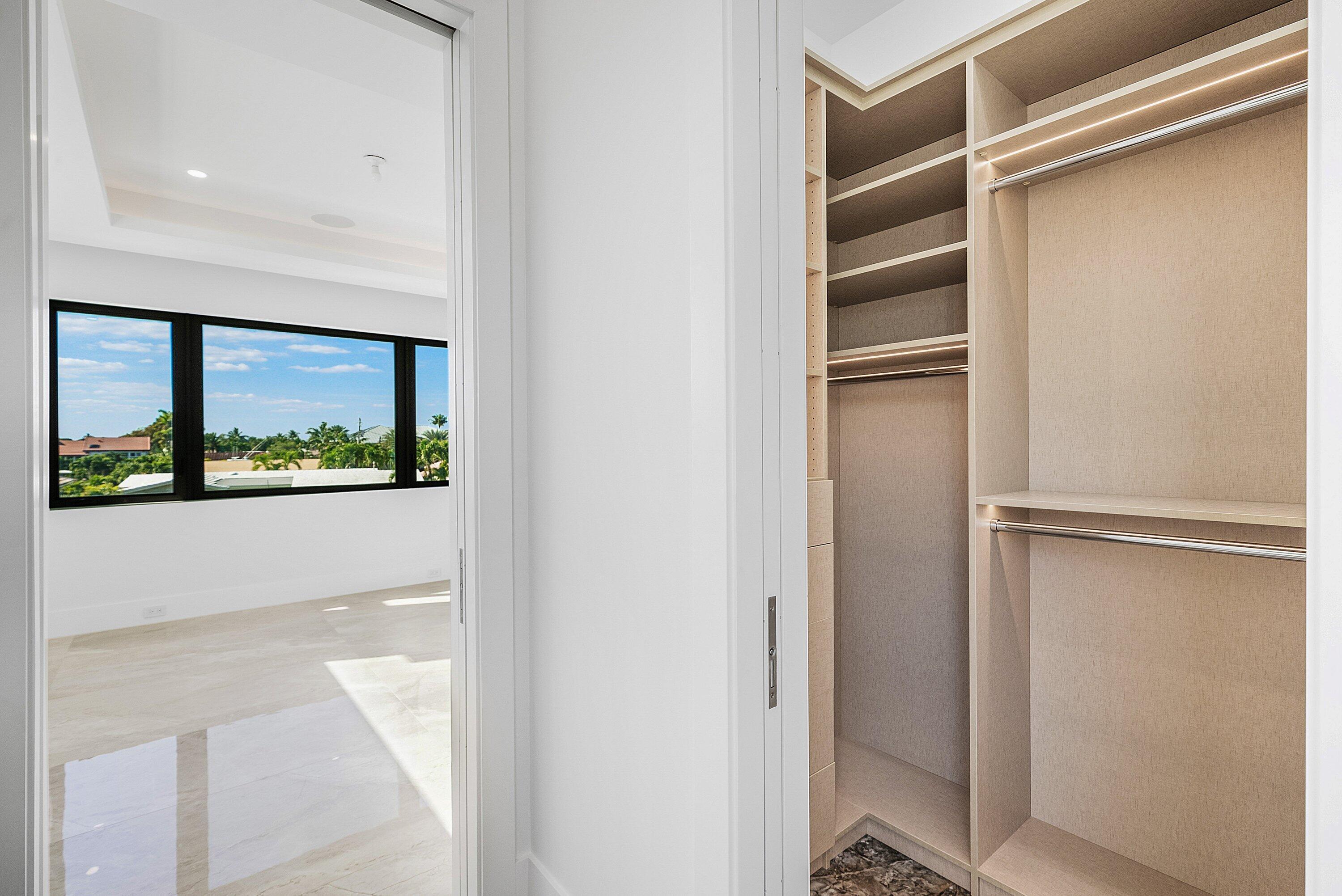 2650 Northeast 48th Court Lighthouse Point, FL 33064 - Photo 40 of 86 a view of walk in closet with window
