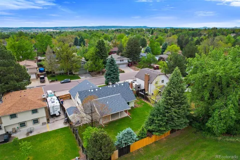 an aerial view of a house with a garden