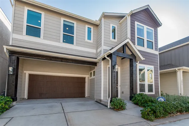 a front view of a house with yard