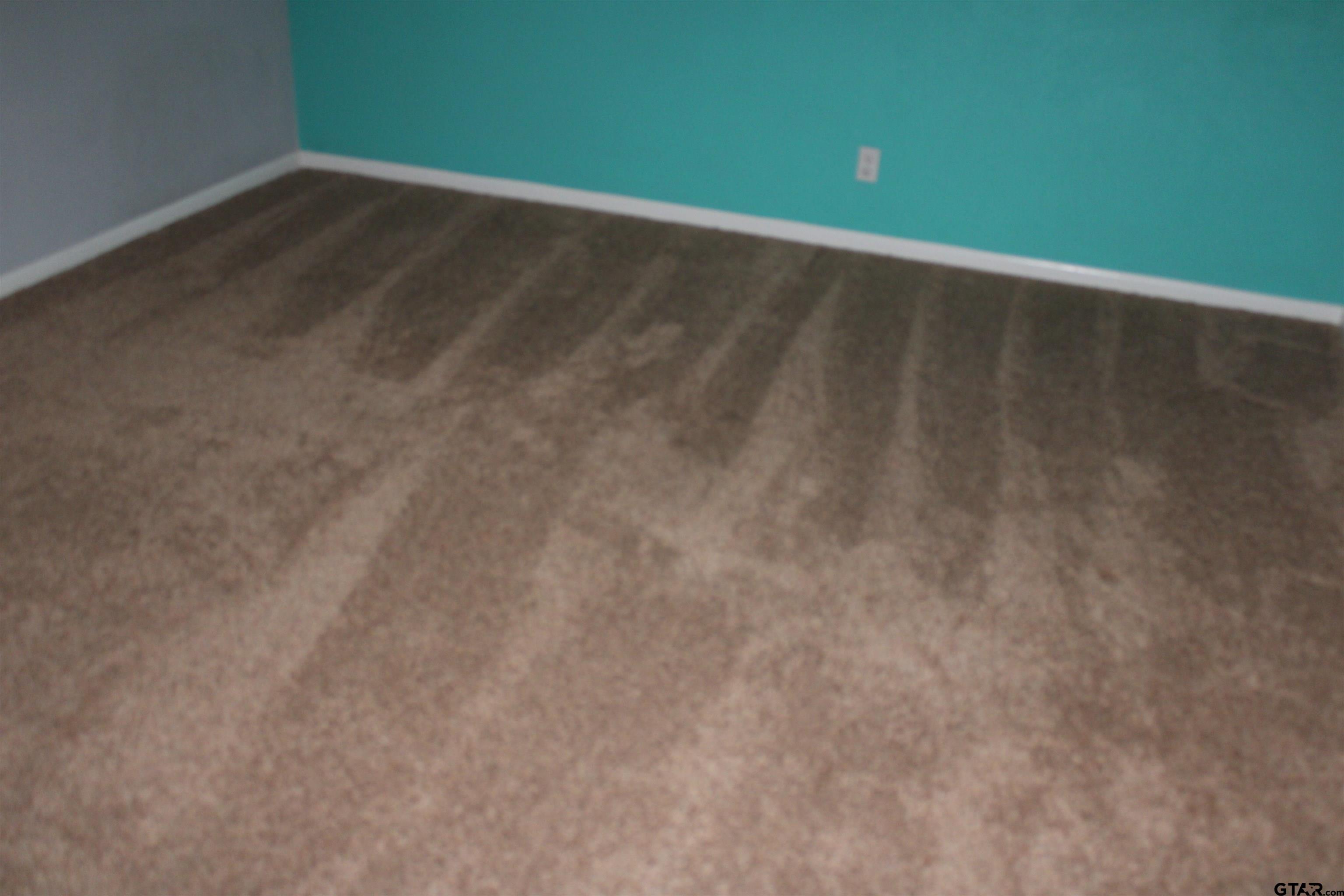 8202 Purdue Drive Tyler, TX 75703 - Photo 16 of 27 a view of a room with wooden floor