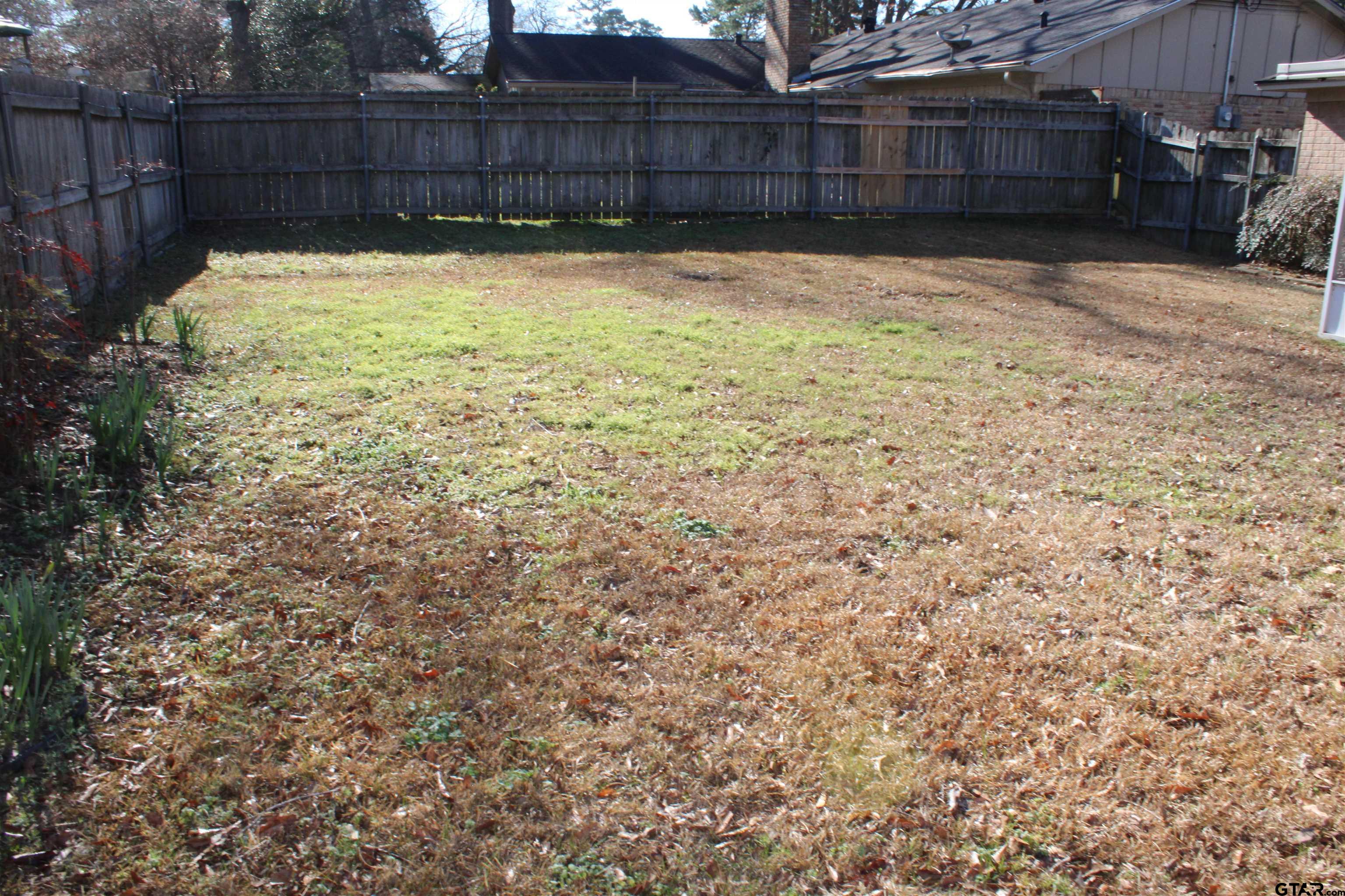 8202 Purdue Drive Tyler, TX 75703 - Photo 27 of 27 a view of a backyard
