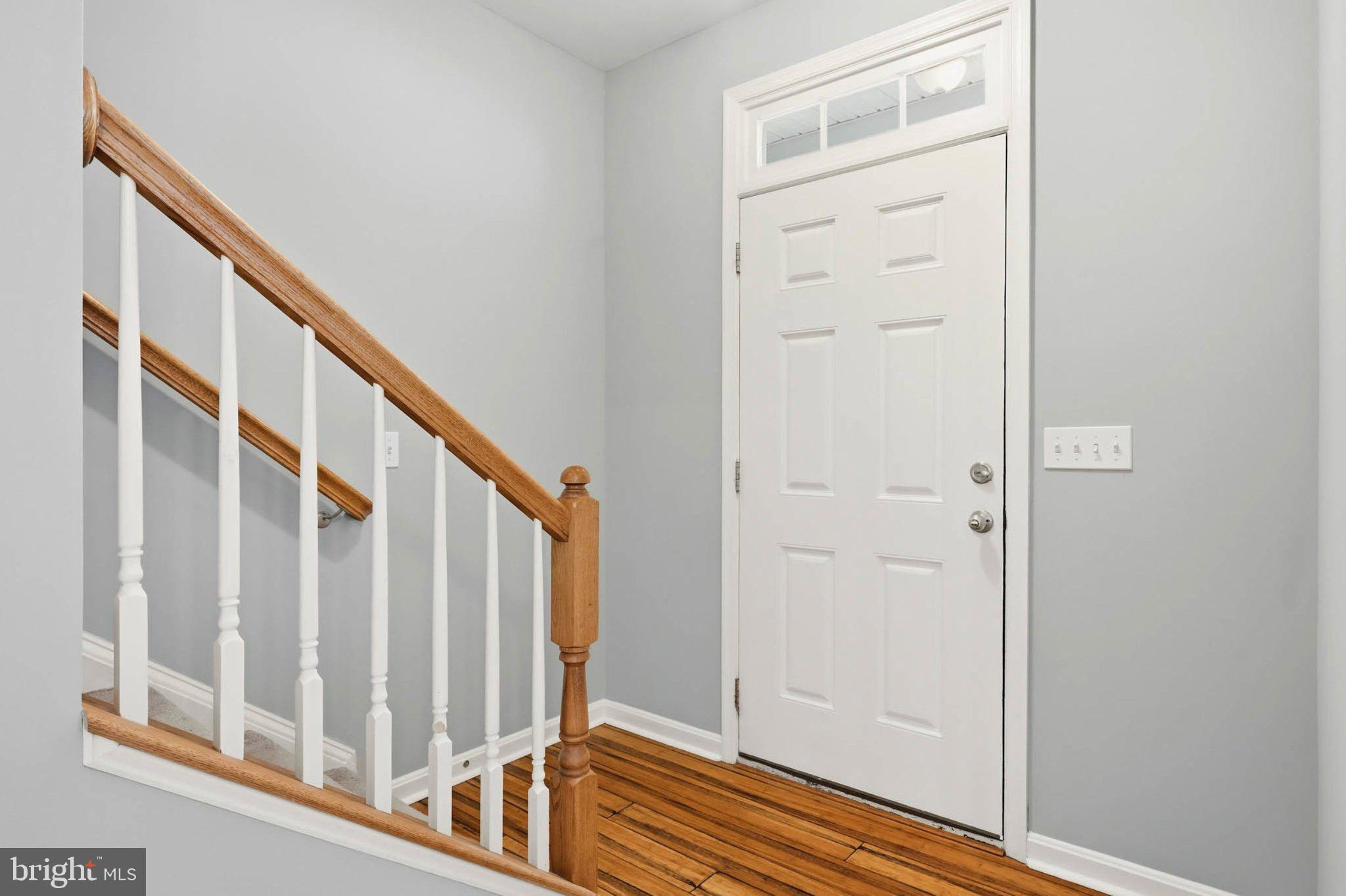706 Trapper Way Deale, MD 20751 - Photo 5 of 61 Inviting entryway with modern charm.
