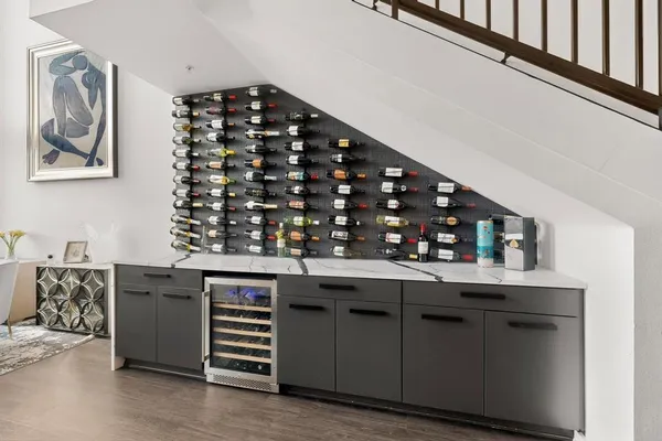 a kitchen with a sink and cabinets