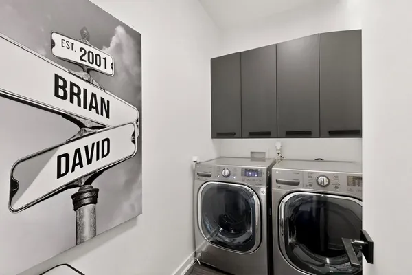 a view of a utility room with washer and dryer