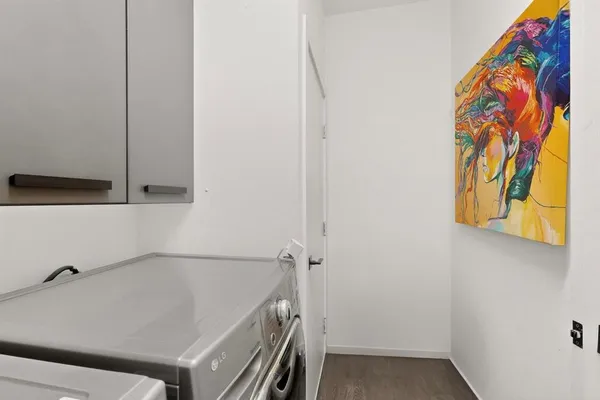 a bathroom with a sink and vanity
