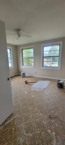 an empty room with windows
