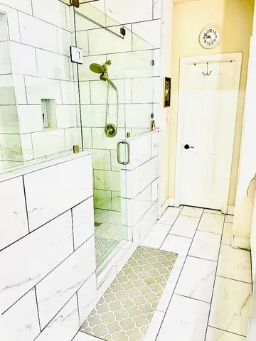 a view of an apartment with a swimming pool