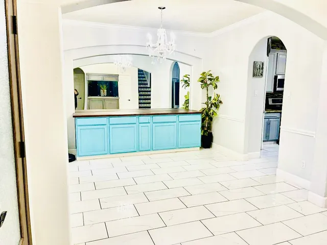 a view of a living room with a large window