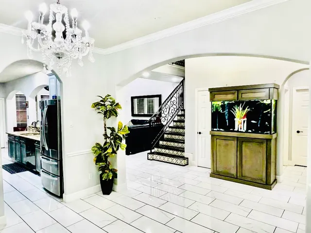 a kitchen with a sink and a stove