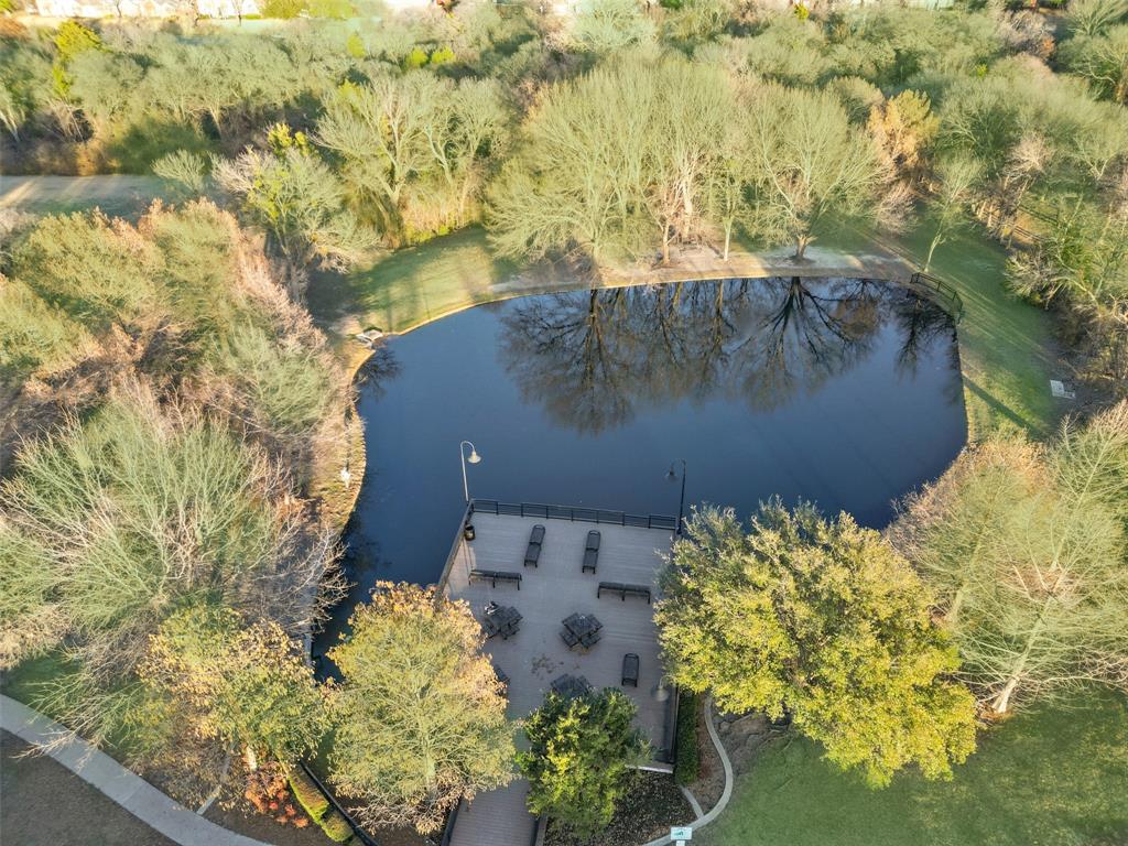3308 North Spring Drive Richardson, TX 75082 - Photo 31 of 38 Enjoy walking distance access to a beautiful community park featuring trails, playgrounds, a peaceful lake, and covered pavilion.