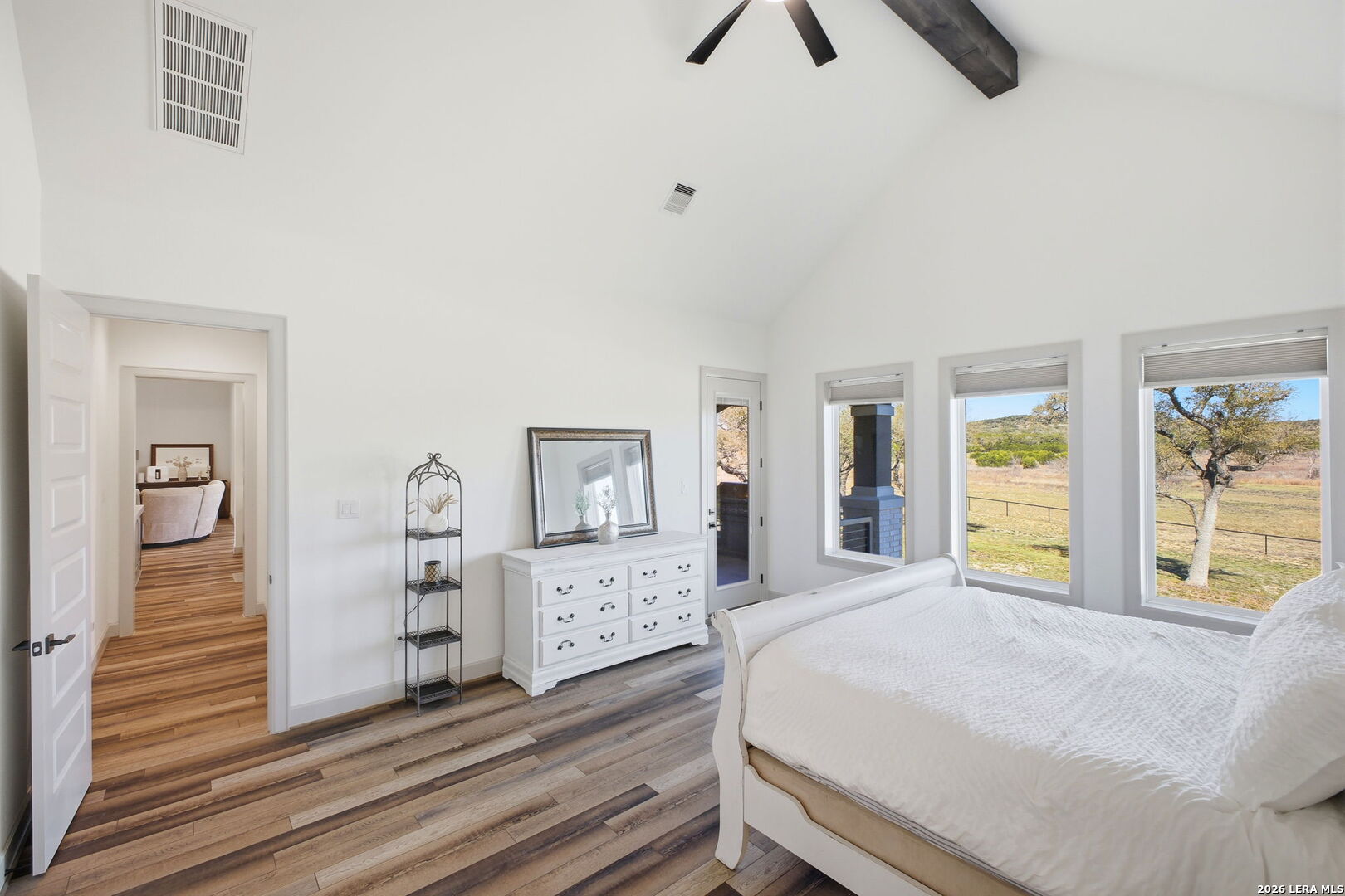 321 Vista View Place Spring Branch, TX 78070 - Photo 26 of 50 a bedroom with a bed and a window
