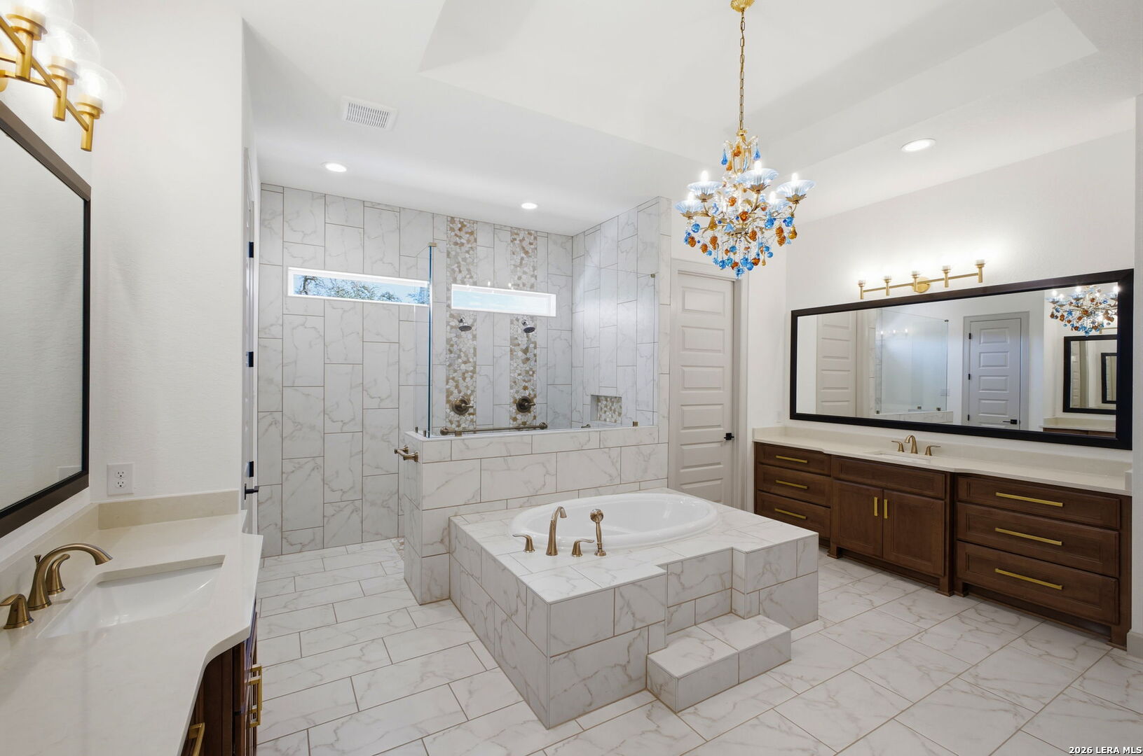 321 Vista View Place Spring Branch, TX 78070 - Photo 28 of 50 a spacious bathroom with a tub sink and mirror