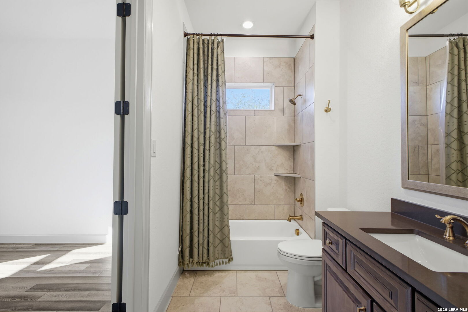 321 Vista View Place Spring Branch, TX 78070 - Photo 37 of 50 a bathroom with a granite countertop toilet a sink and a mirror
