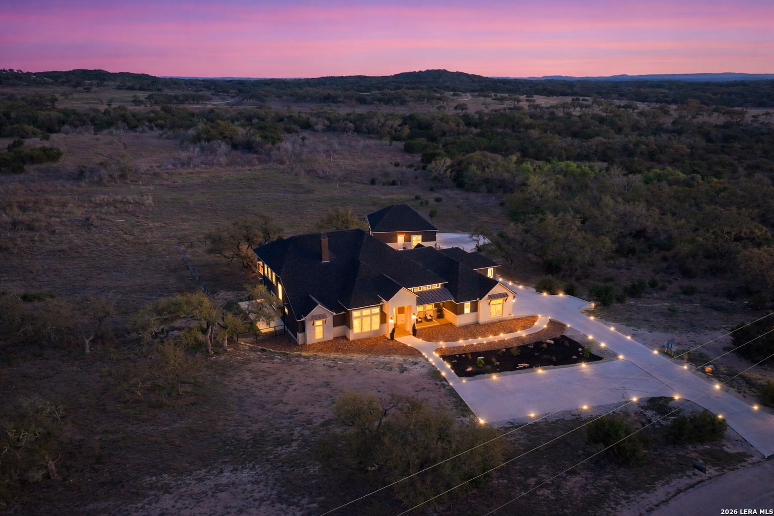 321 Vista View Place Spring Branch, TX 78070 - Photo 4 of 50 an aerial view of a house with a mountain