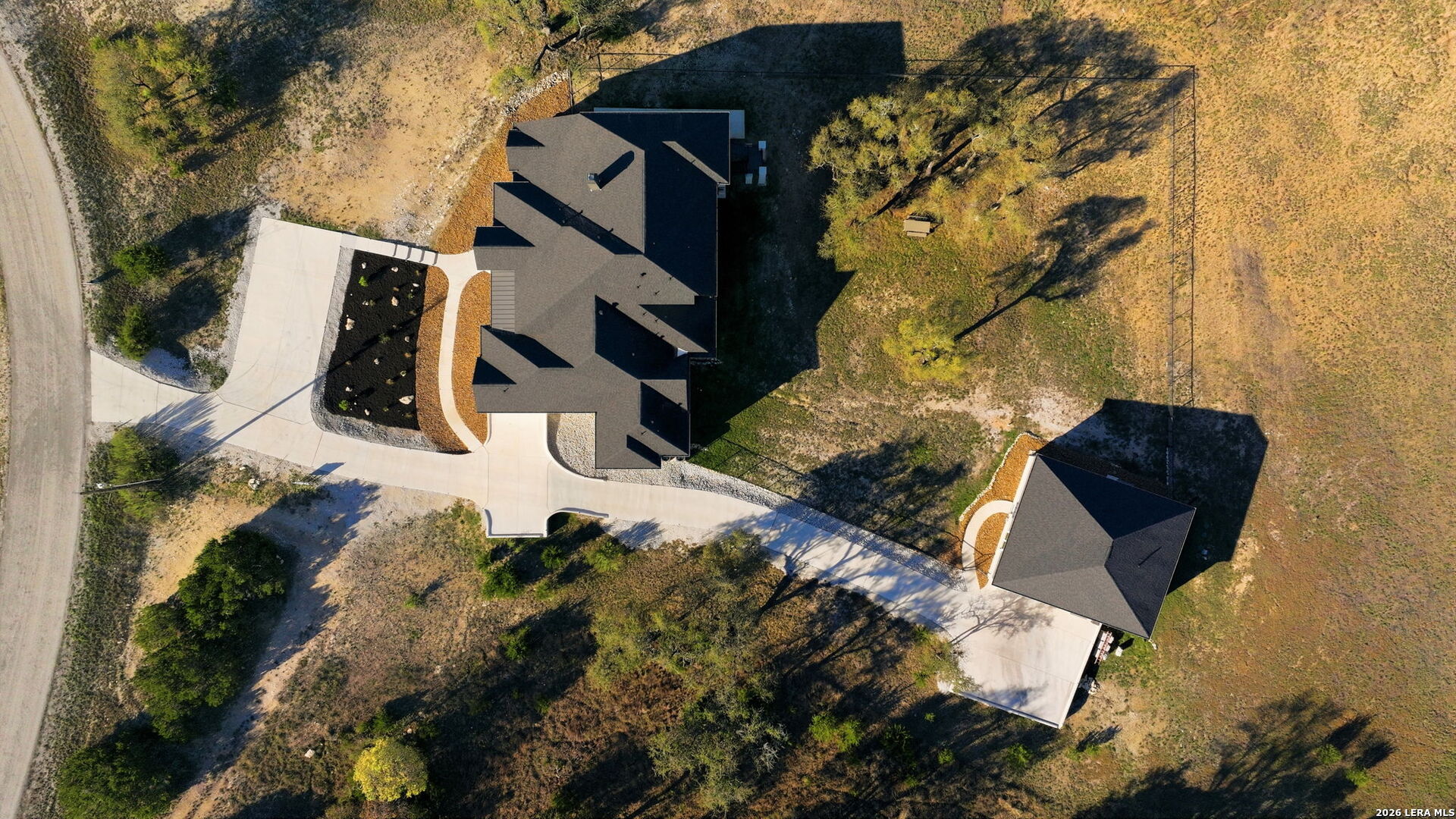 321 Vista View Place Spring Branch, TX 78070 - Photo 48 of 50 an aerial view of a house with a yard