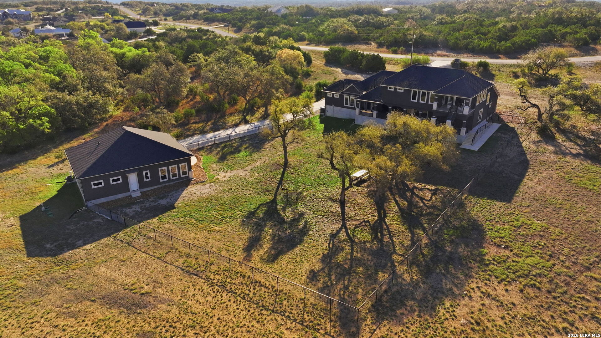 321 Vista View Place Spring Branch, TX 78070 - Photo 49 of 50 a view of a house with a yard